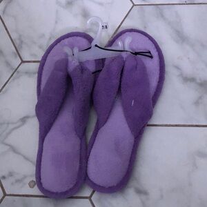 Purple plush flip flop slippers